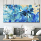 Three-panel canvas wall art featuring abstract coastal beach color fields, displayed in a modern living room above seating.