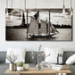 Three-panel canvas wall art featuring historic sailing ships photograph, displayed in a modern living room above seating.