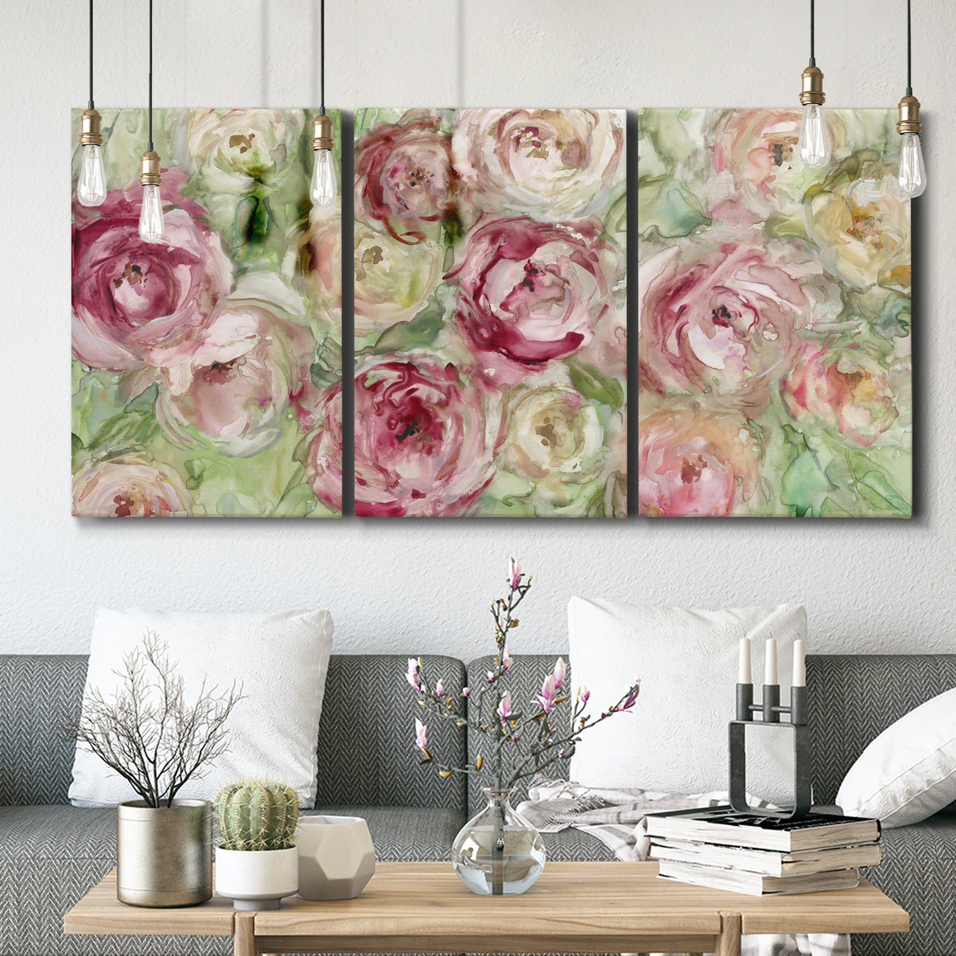 Three-panel canvas wall art featuring blooming climbing rose, displayed in a modern living room above seating.