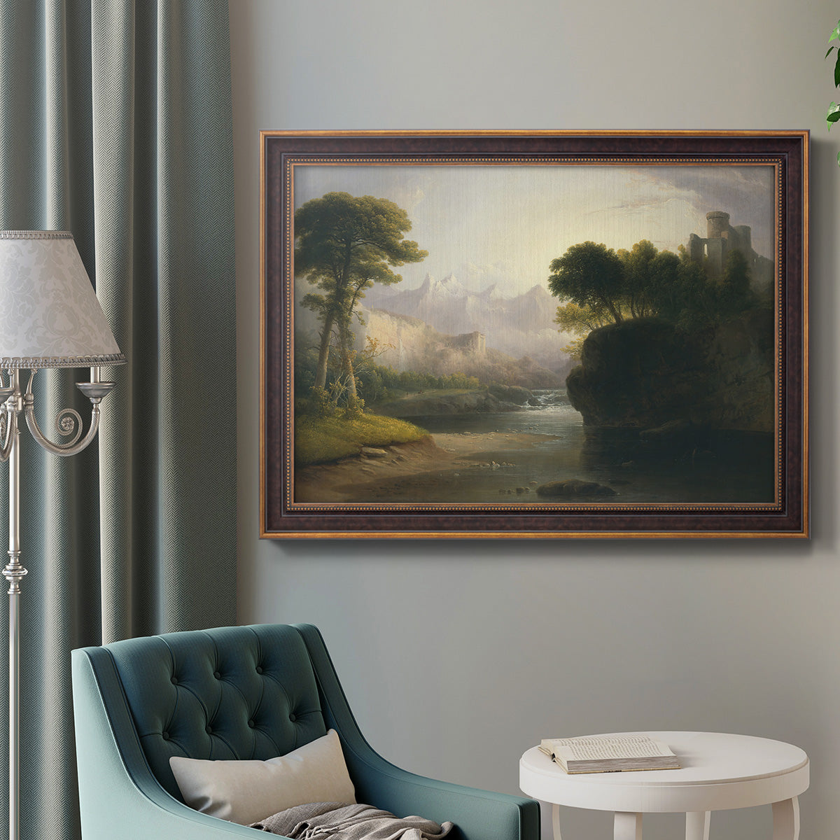 Romantic autumn landscape along the Hudson River by Thomas Doughty in an ornate bronzed mahogany wood frame displayed in a bright interior setting.
