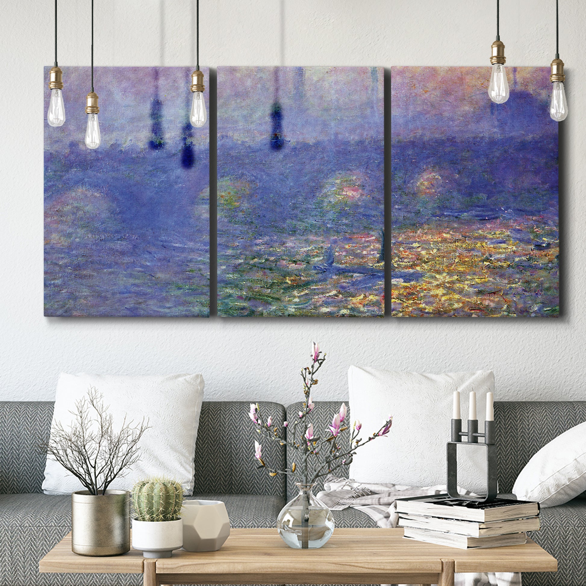 Three-panel canvas wall art featuring overcast bridge above river, displayed in a modern living room above seating.