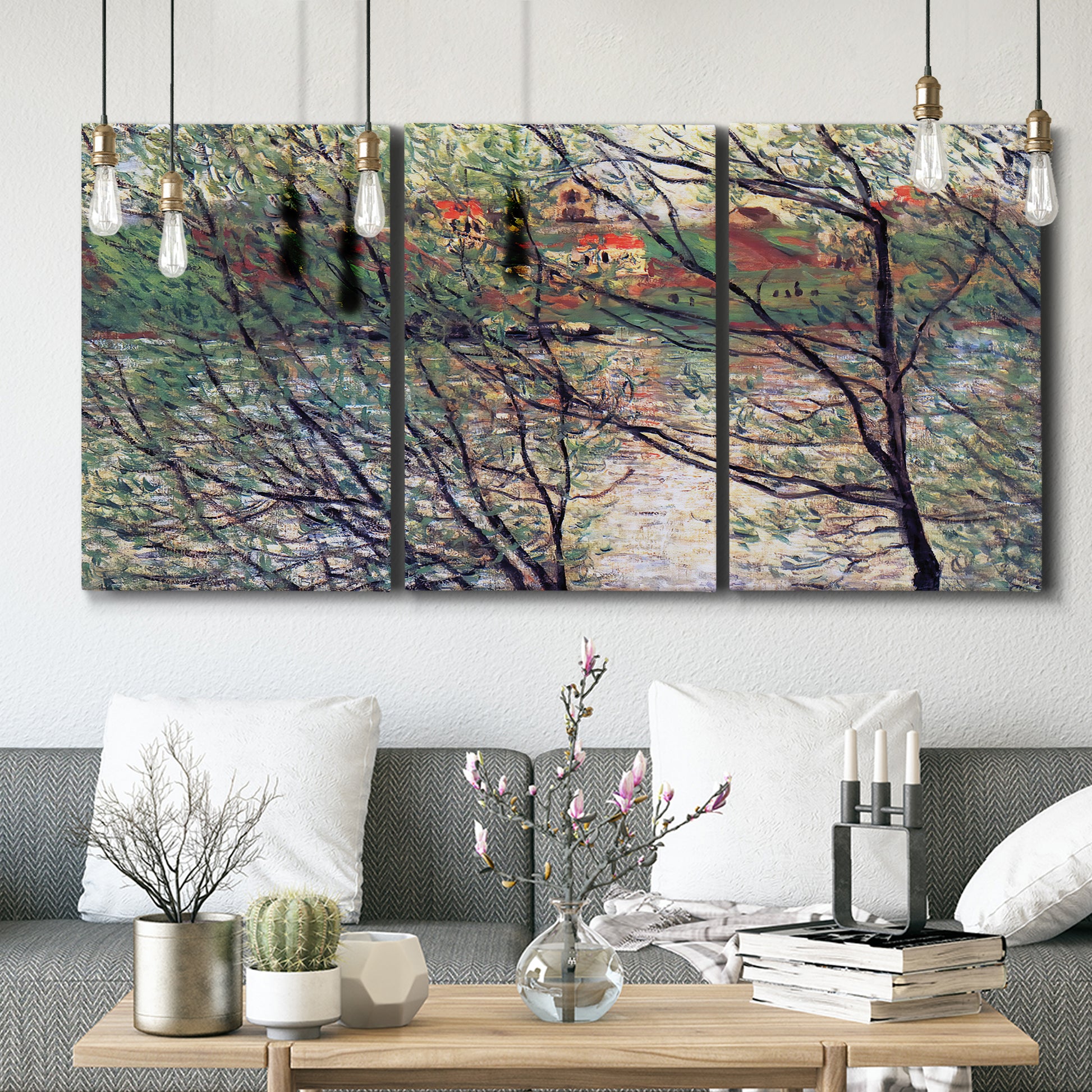 Three-panel canvas wall art featuring riverside park with figures and trees, displayed in a modern living room above seating.