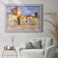 Impressionist Italian village scene by John Singer Sargent in an ornate weathered white frame displayed in a bright interior setting.