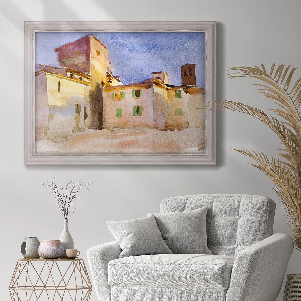 Impressionist Italian village scene by John Singer Sargent in an ornate weathered white frame displayed in a bright interior setting.