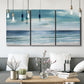 Three-panel canvas wall art featuring calm coastal shoreline, displayed in a modern living room above seating.