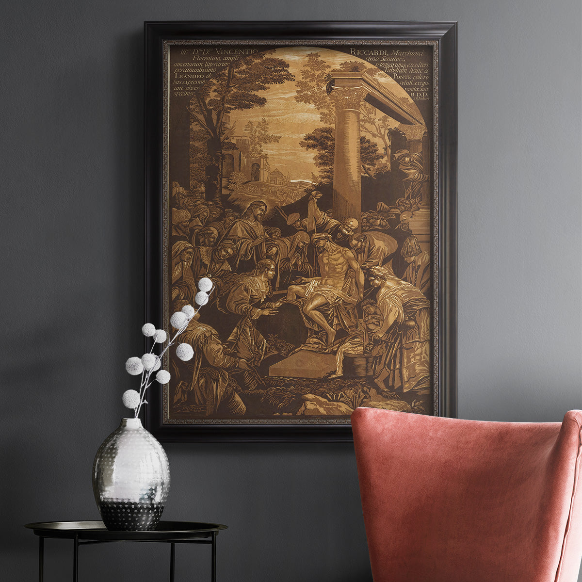 Monochrome religious painting of the raising of Lazarus by Leandro Bassano in an ornate black frame with gilded inner detail displayed in a dark-toned interior setting.