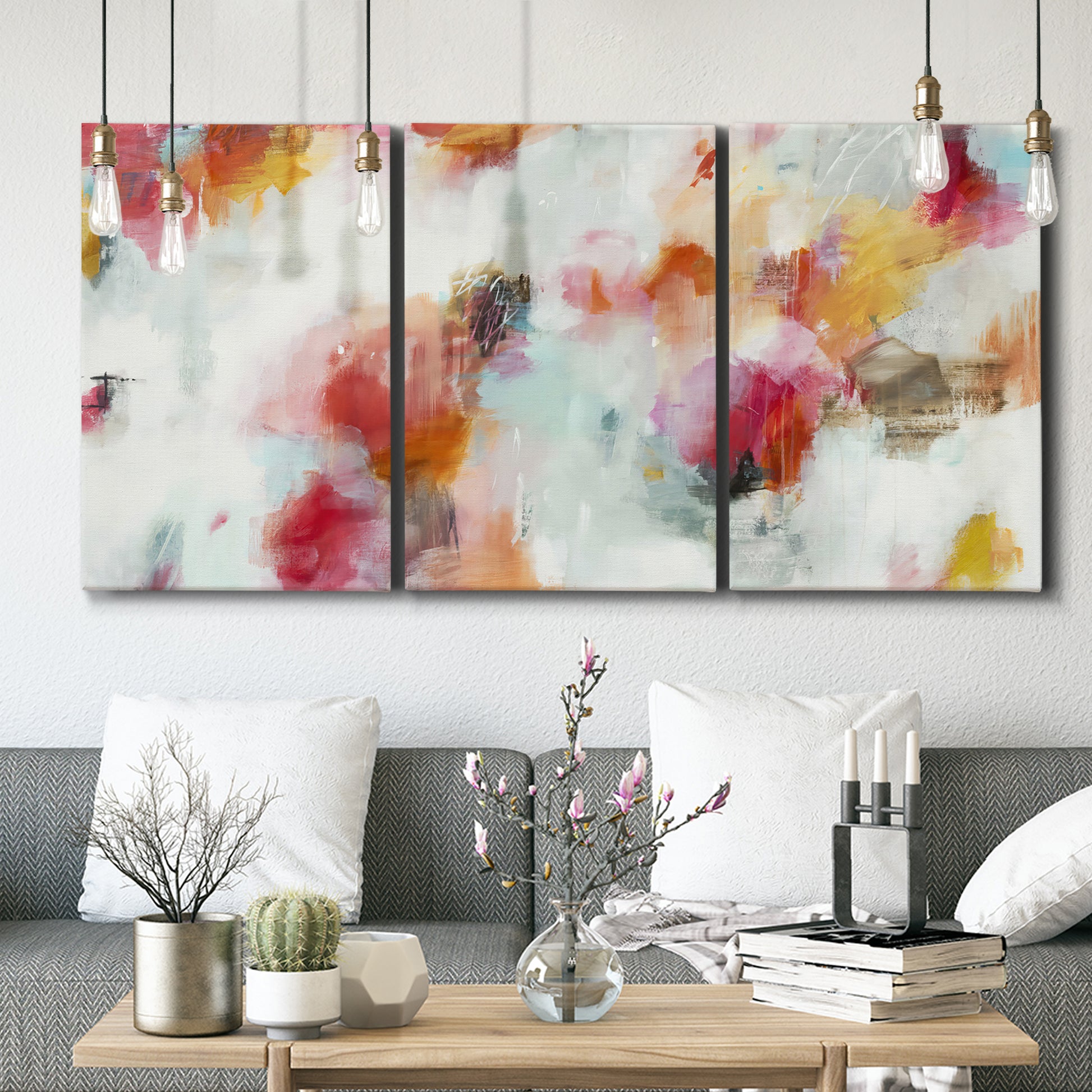 Three-panel canvas wall art featuring abstract directional visual shift, displayed in a modern living room above seating.