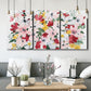 Three-panel canvas wall art featuring joyful spring floral composition, displayed in a modern living room above seating.