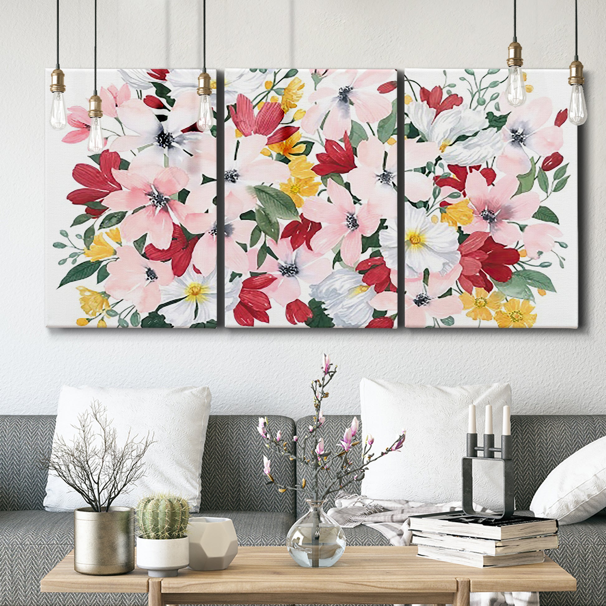 Three-panel canvas wall art featuring joyful spring floral composition, displayed in a modern living room above seating.