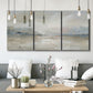 Three-panel canvas wall art featuring soft abstract horizon haze, displayed in a modern living room above seating.