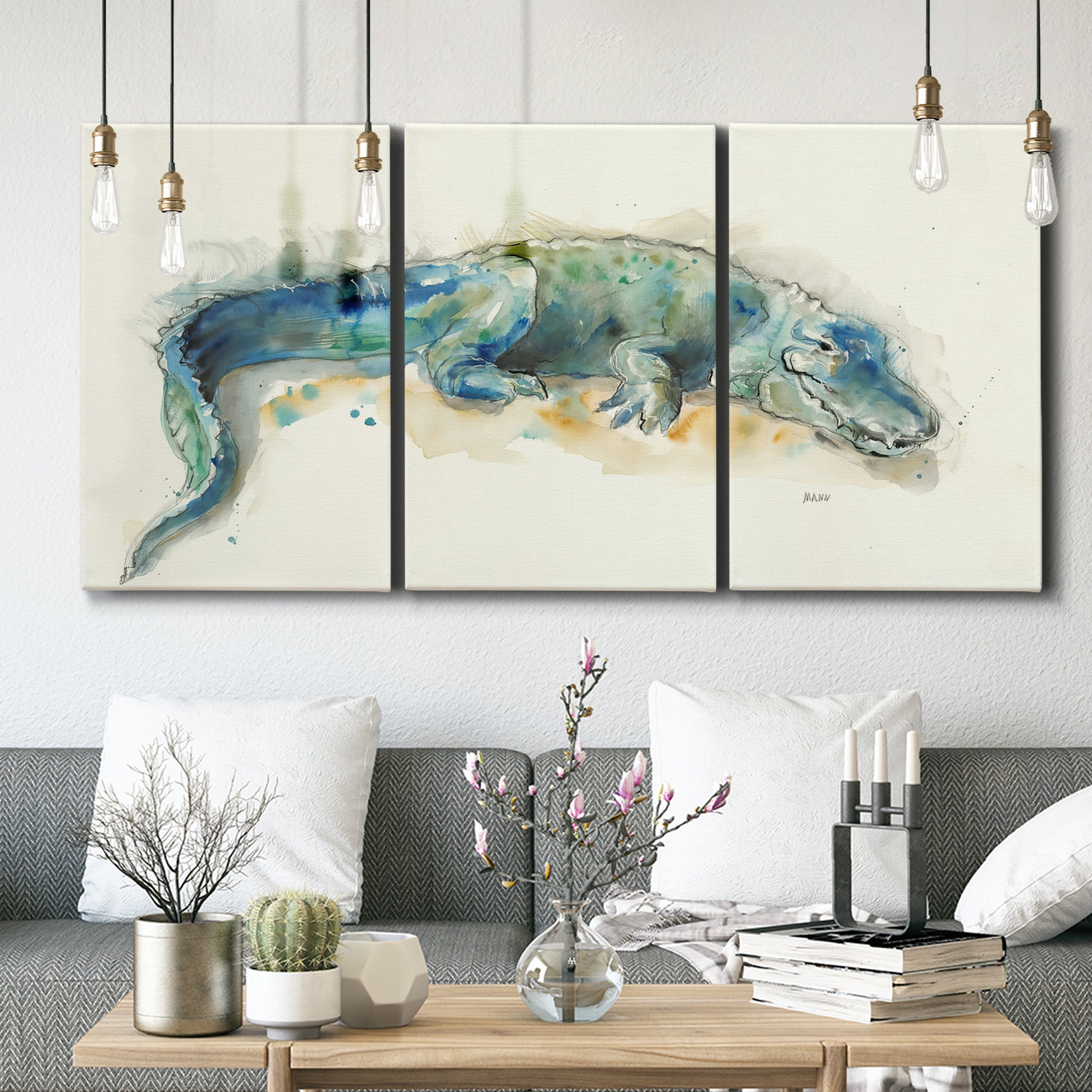 Three-panel canvas wall art featuring alligator illustrated wildlife portrait, displayed in a modern living room above seating.
