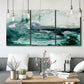Three-panel canvas wall art featuring coastal abstract sea foam movement, displayed in a modern living room above seating.