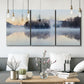 Three-panel canvas wall art featuring misty water landscape photograph, displayed in a modern living room above seating.