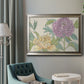 Contemporary peony flower illustration in an ornate mottled silver frame displayed in a neutral interior setting.