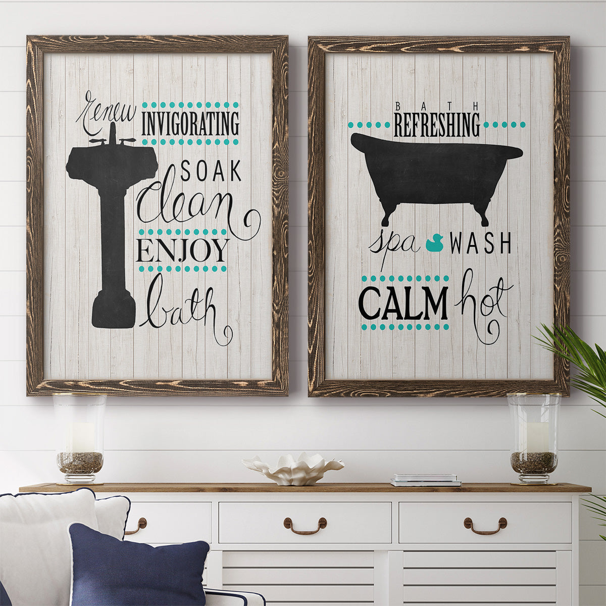 Set of two walnut barnwood framed canvas prints depicting a coordinated art pair of playful bathtub silhouettes and bath-themed typography rendered as graphic bathroom word art above a dining room sideboard.