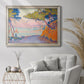 Pointillist coastal seascape by Paul Signac in an ornate champagne frame displayed in a bright interior setting.