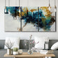 Three-panel canvas wall art featuring teal abstract paint splatter, displayed in a modern living room above seating.