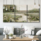 Three-panel canvas wall art featuring narrow path through quiet landscape, displayed in a modern living room above seating.