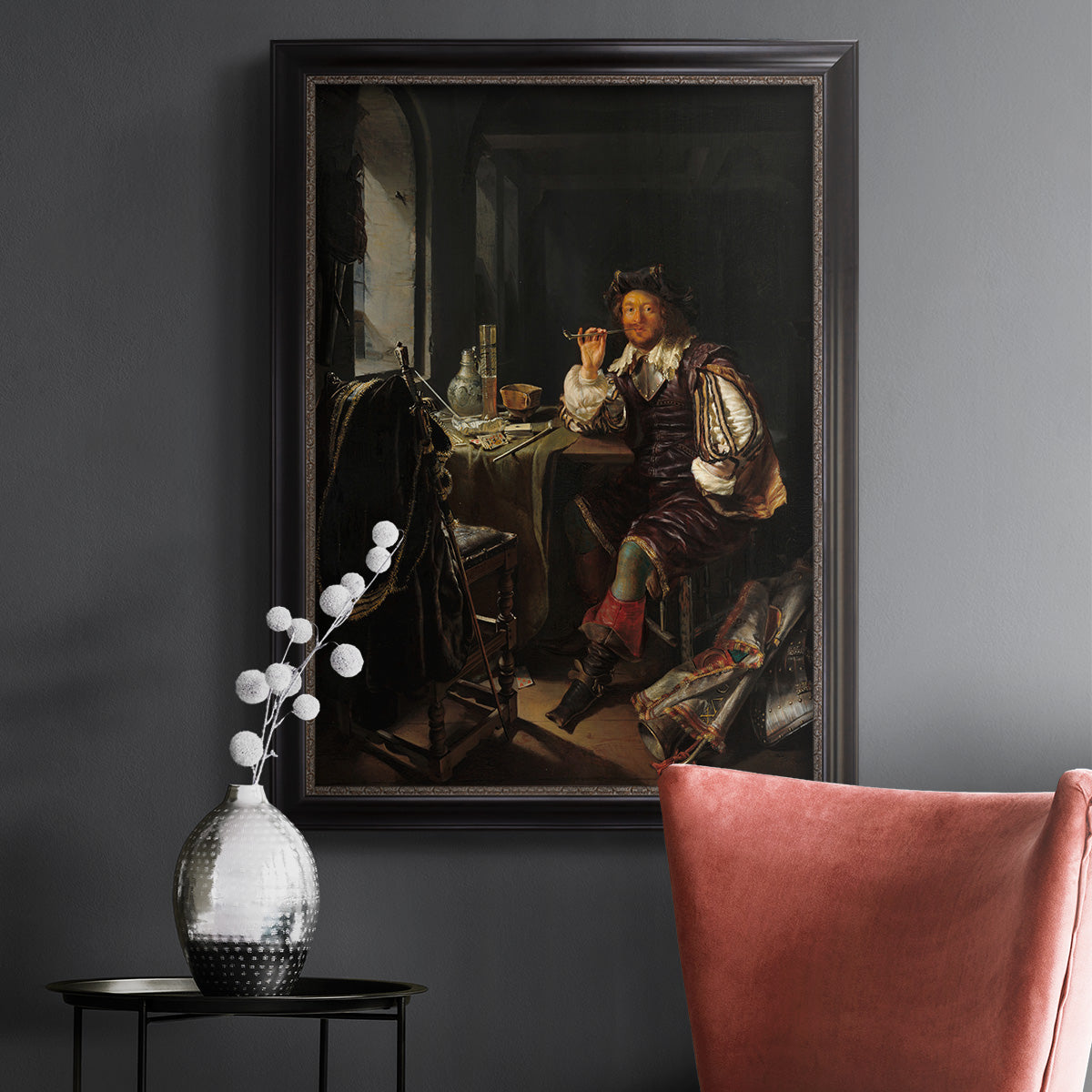Classical portrait of a soldier smoking a pipe by Frans van Mieris the Elder in an ornate black frame with gilded inner detail displayed in a dark-toned interior setting.