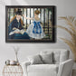 Impressionist urban scene near a railway by Édouard Manet in an ornate black frame with gilded inner detail displayed in a bright interior setting.