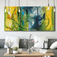 Three-panel canvas wall art featuring energetic abstract aquatic color motion, displayed in a modern living room above seating.