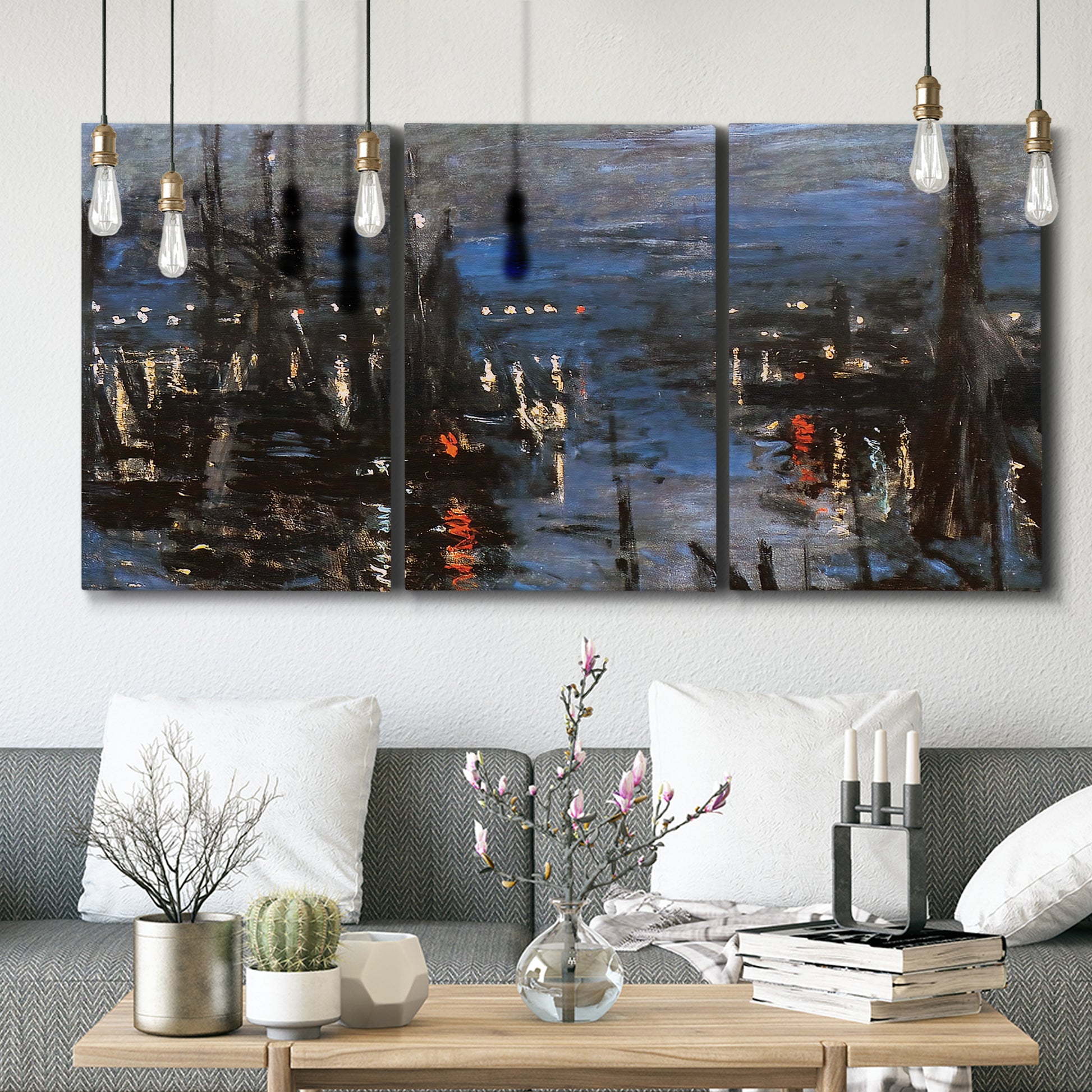 Three-panel canvas wall art featuring Le Havre port at night with lights, displayed in a modern living room above seating.