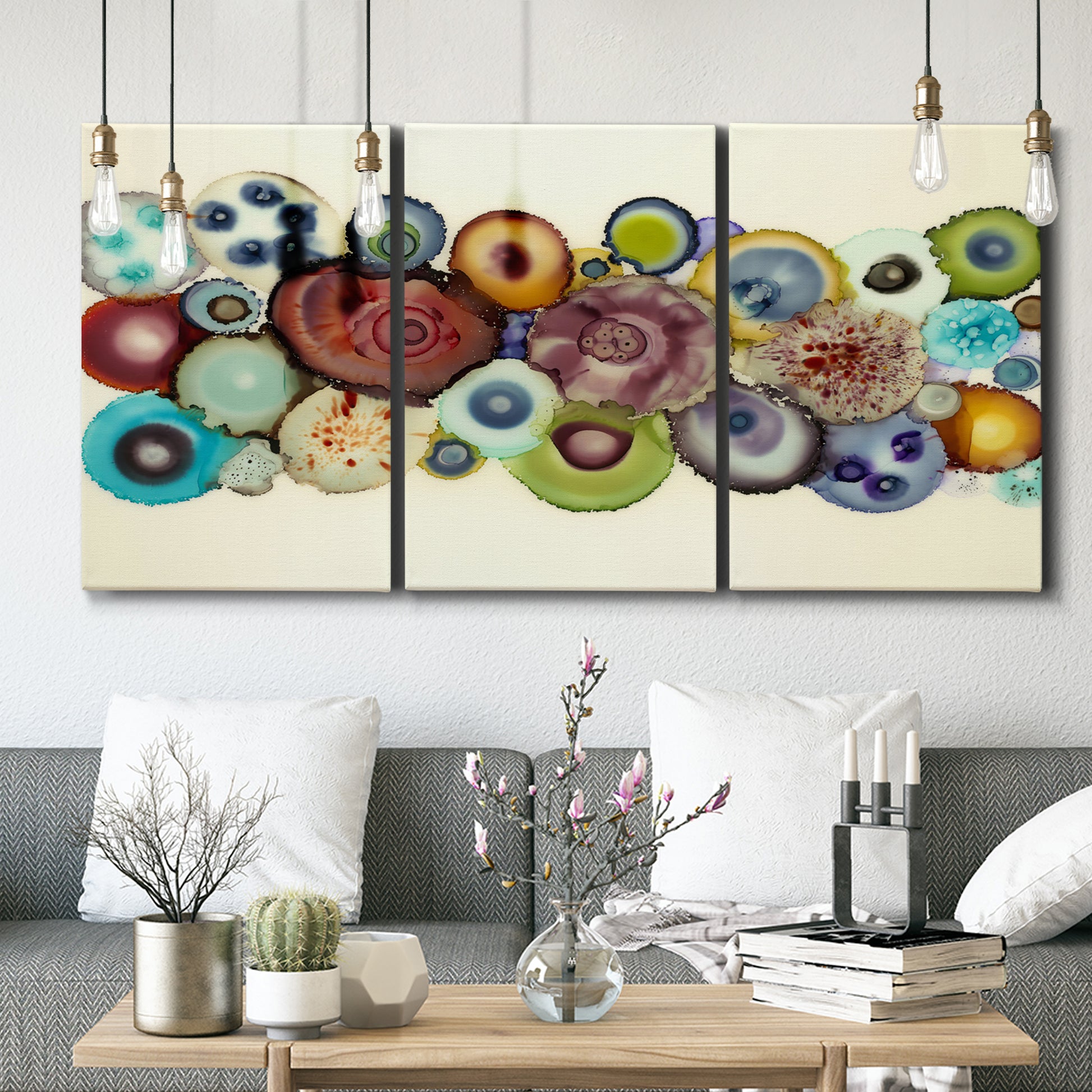 Three-panel canvas wall art featuring mid century geometric red pathway, displayed in a modern living room above seating.