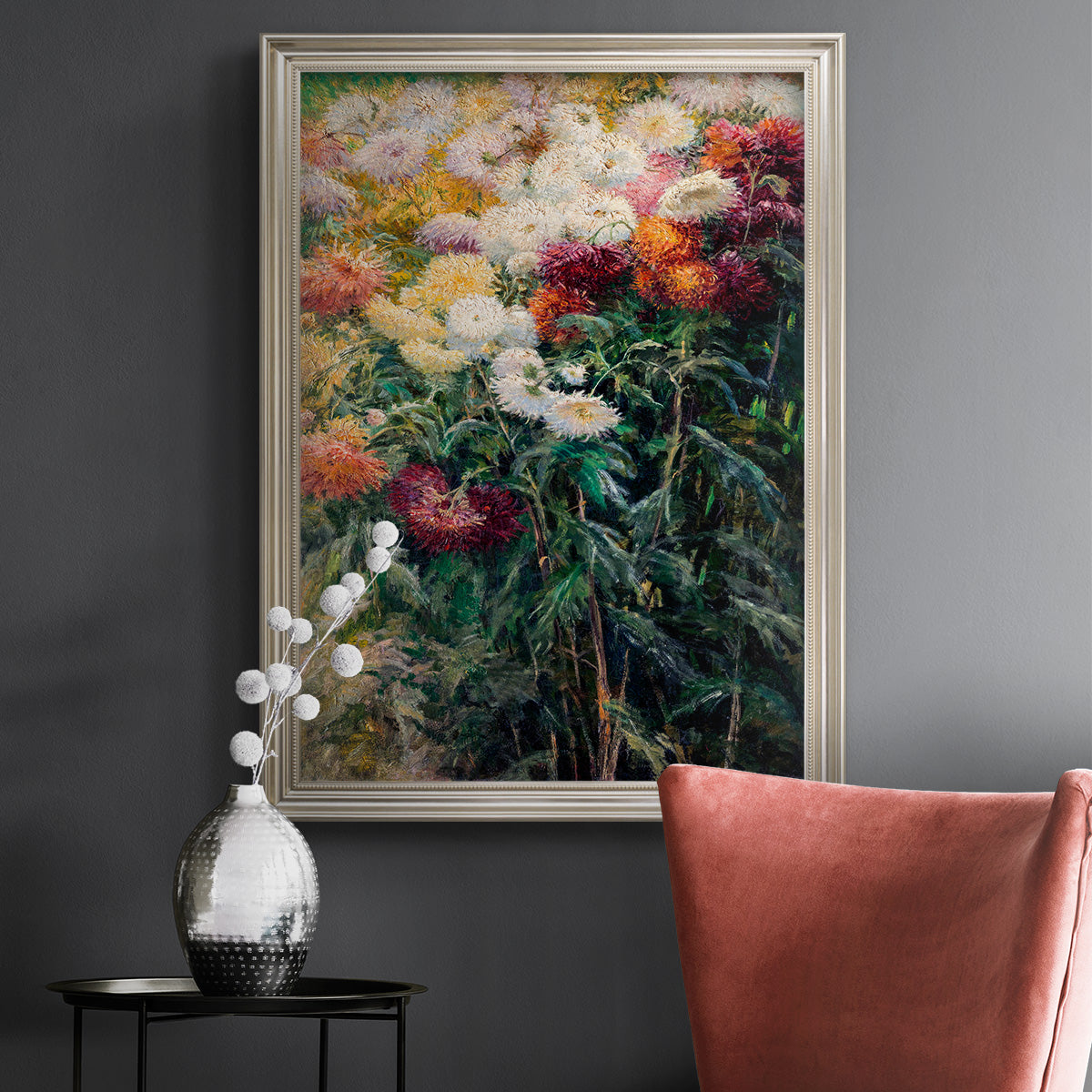 Impressionist garden floral painting by Gustave Caillebotte in an ornate champagne frame displayed in a dark-toned interior setting.