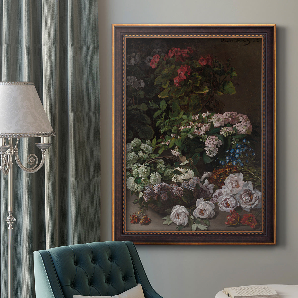 Early impressionist floral painting by Claude Monet in an ornate bronzed mahogany wood frame displayed in a dark-toned interior setting.
