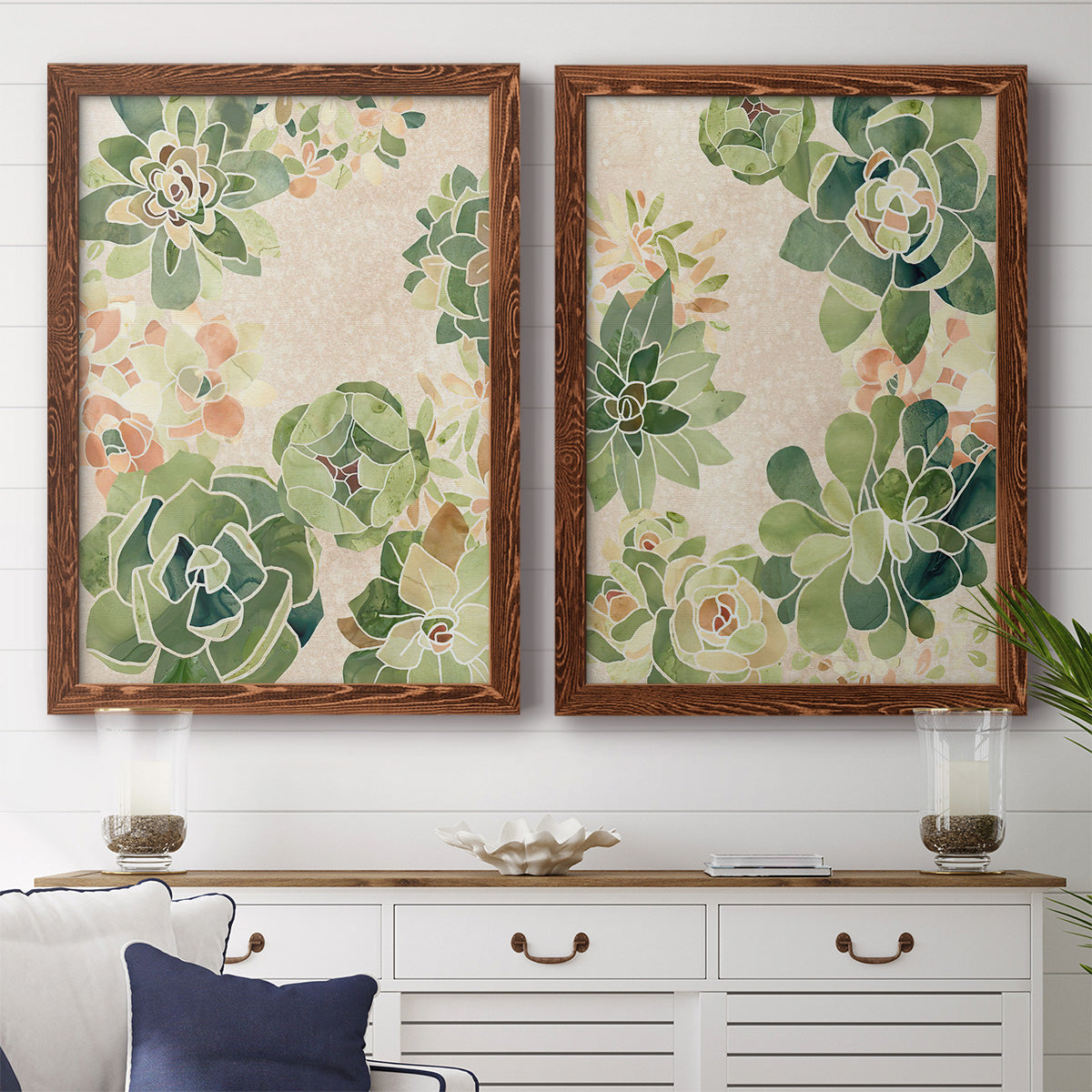 Set of two maple barnwood framed canvas prints depicting a coordinated art pair of dense repeating succulents and small flowers rendered as decorative botanical pattern prints above a dining room sideboard.
