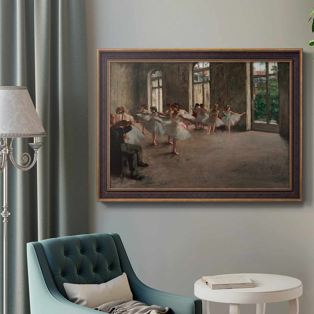 Early impressionist ballet rehearsal painting by Edgar Degas in an ornate bronzed mahogany wood frame displayed in a bright interior setting.