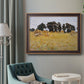 Impressionist rural harvest scene by John Singer Sargent in an ornate bronzed mahogany wood frame displayed in a bright interior setting.