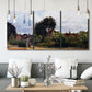 Three-panel canvas wall art featuring garden corner with flowering trees, displayed in a modern living room above seating.