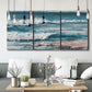 Three-panel canvas wall art featuring crashing ocean waves along shoreline, displayed in a modern living room above seating.