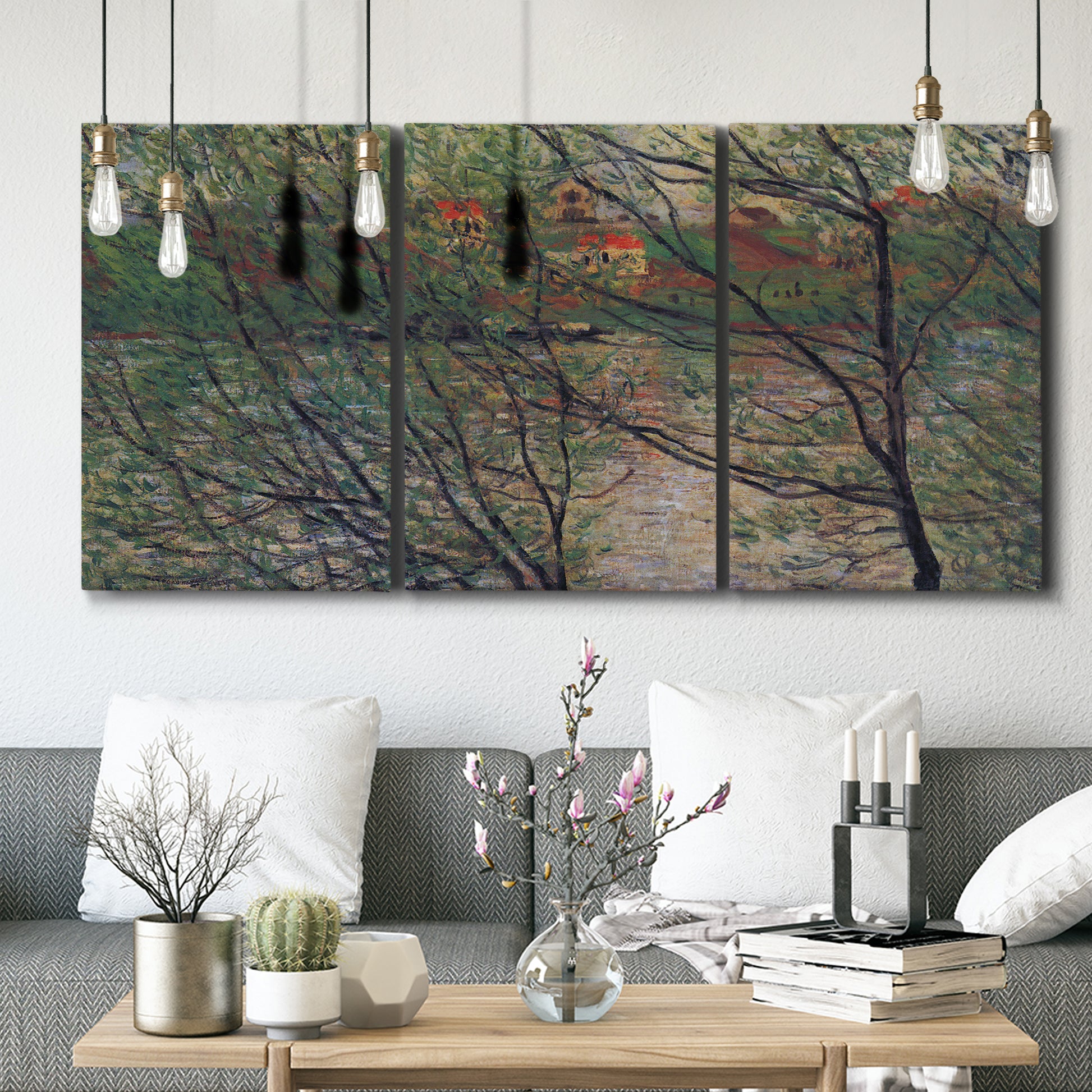 Three-panel canvas wall art featuring spring countryside with fresh foliage, displayed in a modern living room above seating.