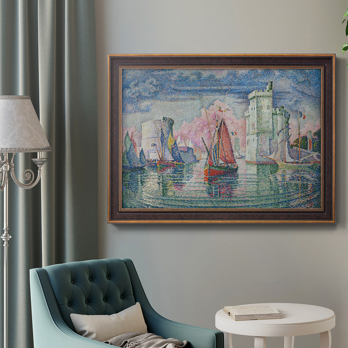 Impressionist harbor scene by Paul Signac in an ornate bronzed mahogany wood frame displayed in a bright interior setting.