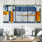 Three-panel canvas wall art featuring bright mid century geometric abstraction, displayed in a modern living room above seating.