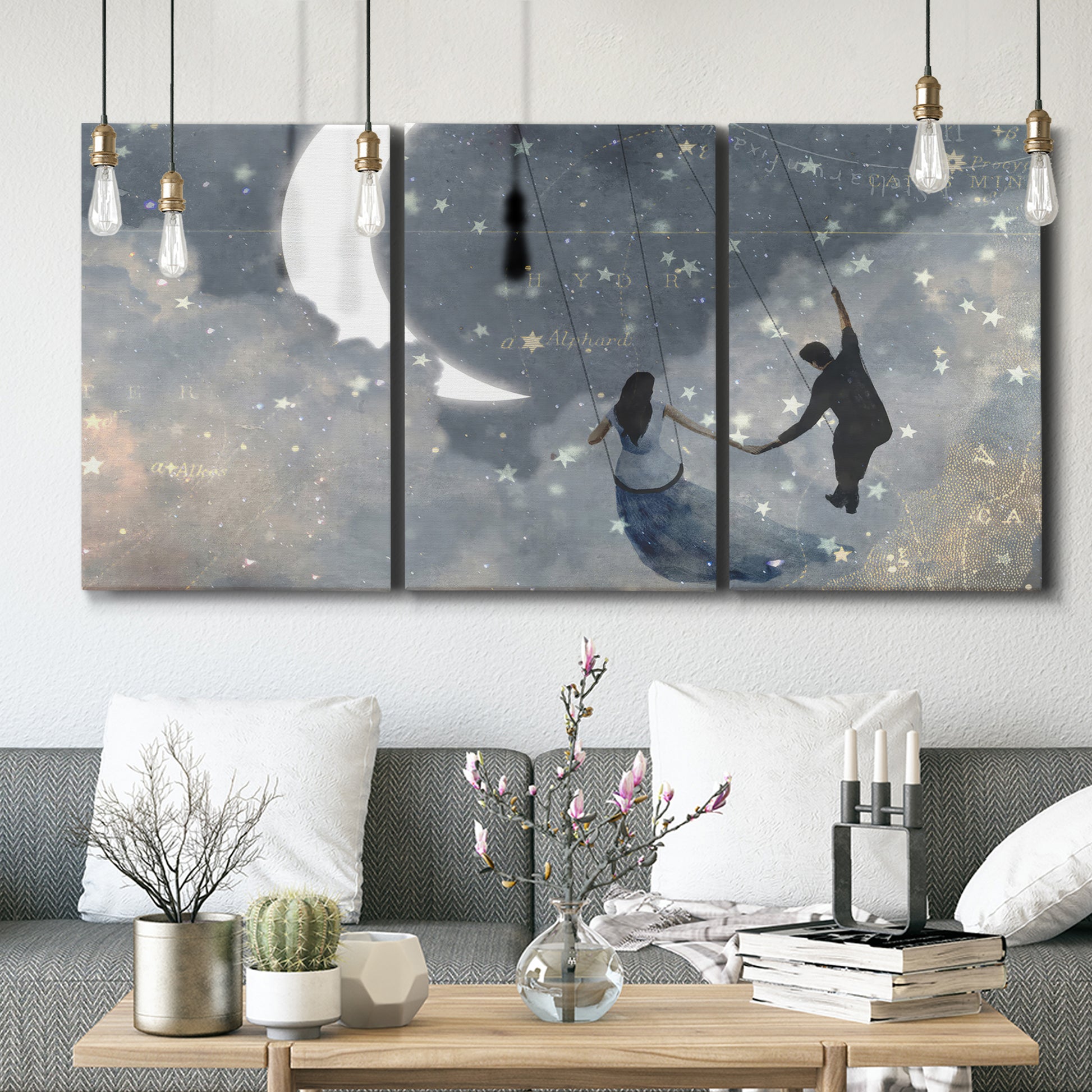 Three-panel canvas wall art featuring surreal celestial romantic scene, displayed in a modern living room above seating.