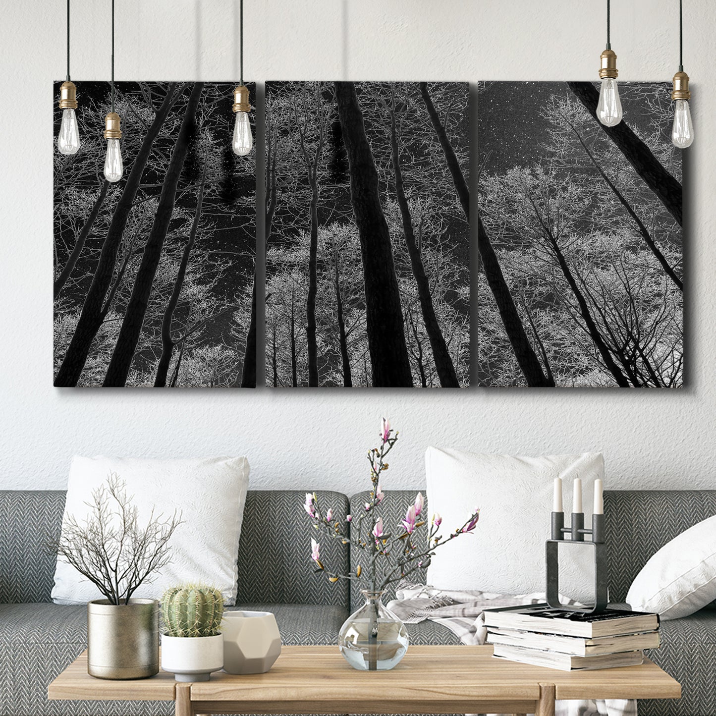 Three-panel canvas wall art featuring riverside houses along canal, displayed in a modern living room above seating.