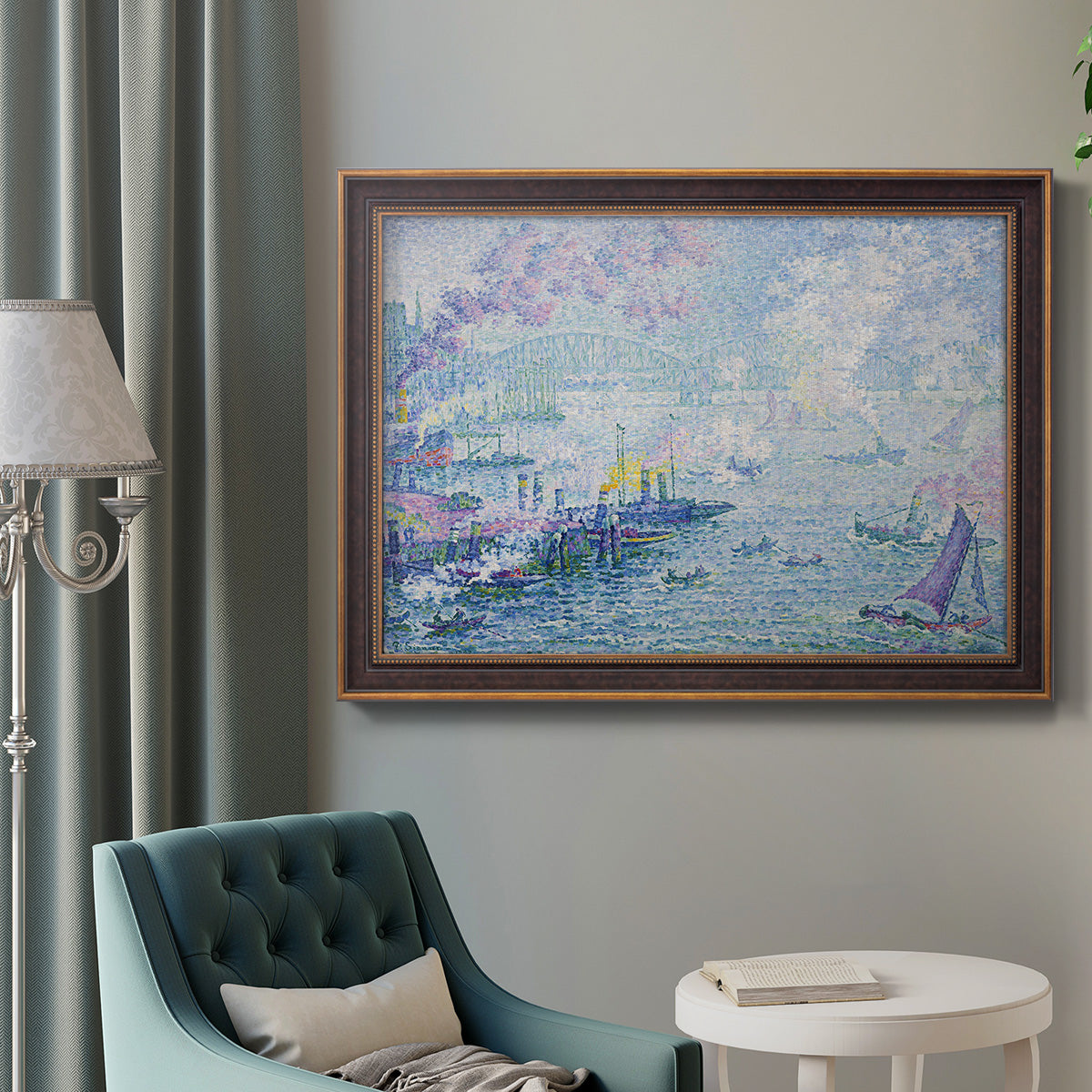 Impressionist industrial harbor scene by Paul Signac in an ornate bronzed mahogany wood frame displayed in a bright interior setting.