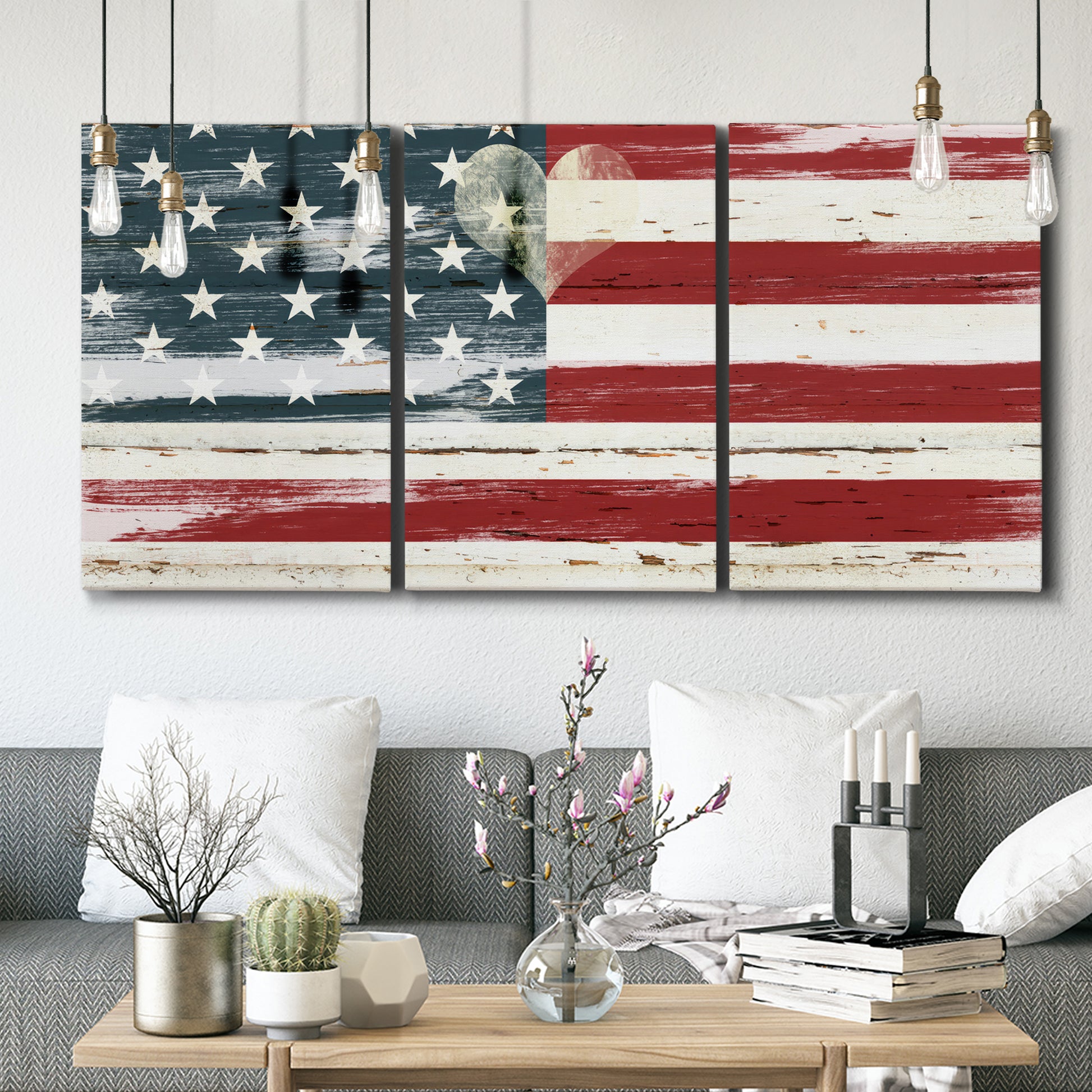 Three-panel canvas wall art featuring rustic american flag country style, displayed in a modern living room above seating.
