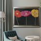 Contemporary poppy flower artwork in an ornate mottled silver frame displayed in a neutral interior setting.