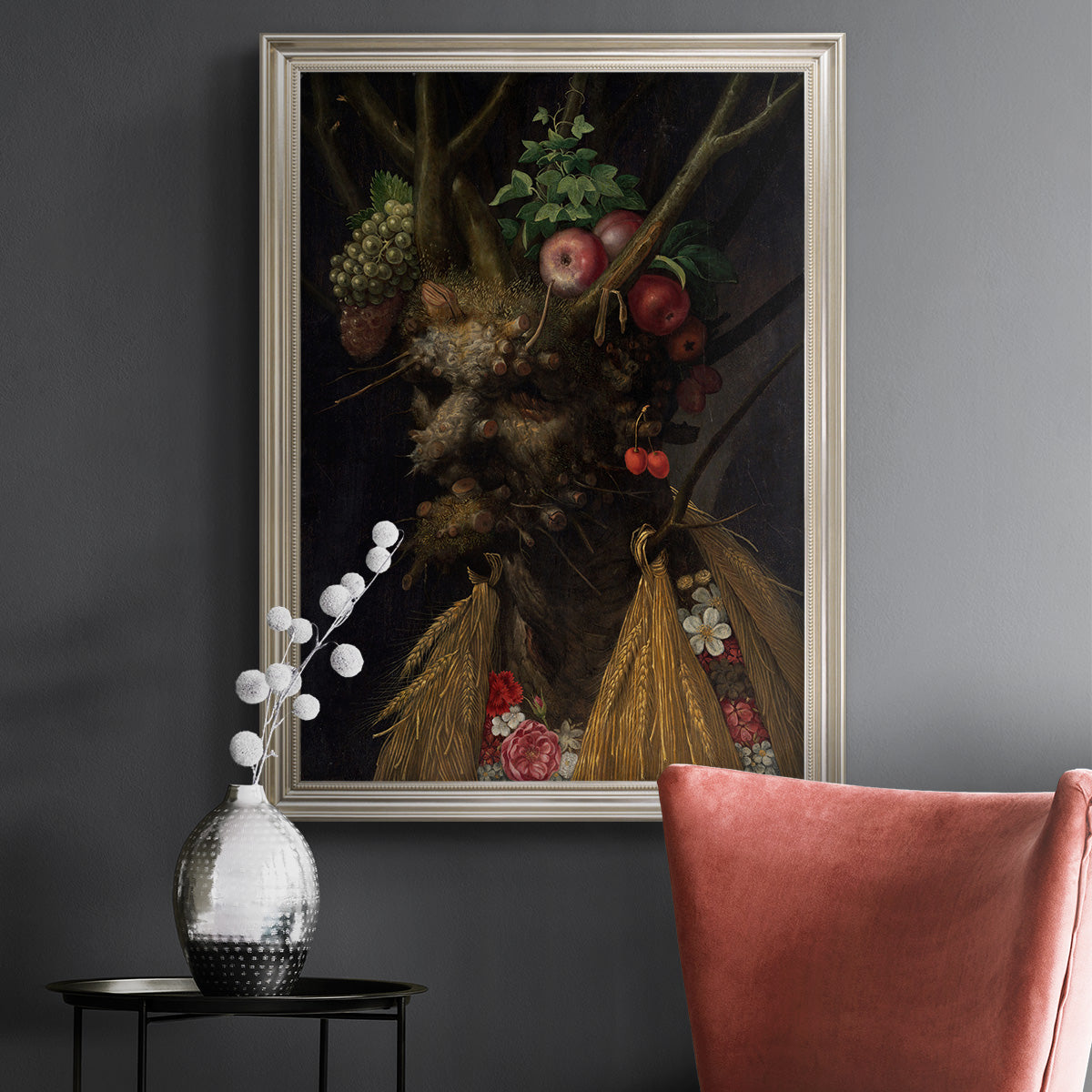 Surreal allegorical portrait representing the four seasons by Giuseppe Arcimboldo in an ornate champagne frame displayed in a dark-toned interior setting.