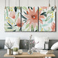 Three-panel canvas wall art featuring tropical botanical collage, displayed in a modern living room above seating.