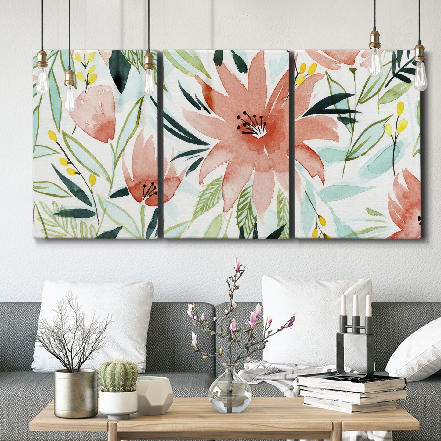 Three-panel canvas wall art featuring tropical botanical collage, displayed in a modern living room above seating.