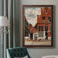 Realist city street scene by Johannes Vermeer in an ornate bronzed mahogany wood frame displayed in a dark-toned interior setting.