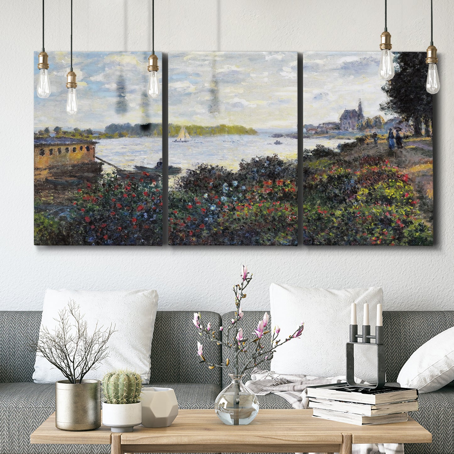 Three-panel canvas wall art featuring river with boats and shoreline, displayed in a modern living room above seating.