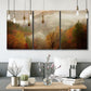 Three-panel canvas wall art featuring misty autumn landscape photograph, displayed in a modern living room above seating.