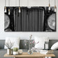 Three-panel canvas wall art featuring vintage car grille detail, displayed in a modern living room above seating.