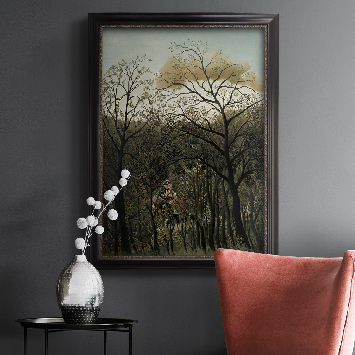Dreamlike forest landscape scene by Henri Rousseau in an ornate black frame with gilded inner detail displayed in a dark-toned interior setting.